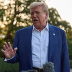 B-2 stealth bomber aircraft flying over mountainous terrain, dropping bombs in a military strike against Iran’s nuclear sites, as shown in Donald Trump’s controversial social media video.