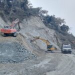 Heavy vehicles stopped on Narayanghat–Butwal road near Vinayi Khola Bridge in Nawalparasi due to temporary ban and ongoing repair work"