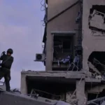 Missile trail over sky during Iran-Israel conflict with explosions reported in Tehran