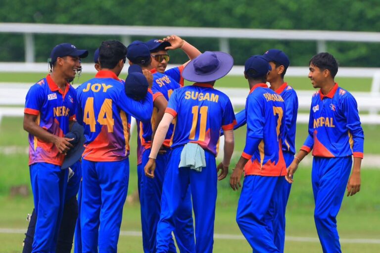 Nepal Under-16 cricket bowlers celebrate taking early wickets against Singapore during ACC East Zone Cup final at UKM YSD Oval, Malaysia.