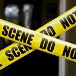 Police in Rukum West, Nepal, escorting a man arrested for allegedly killing his wife with a khukuri during a domestic dispute.