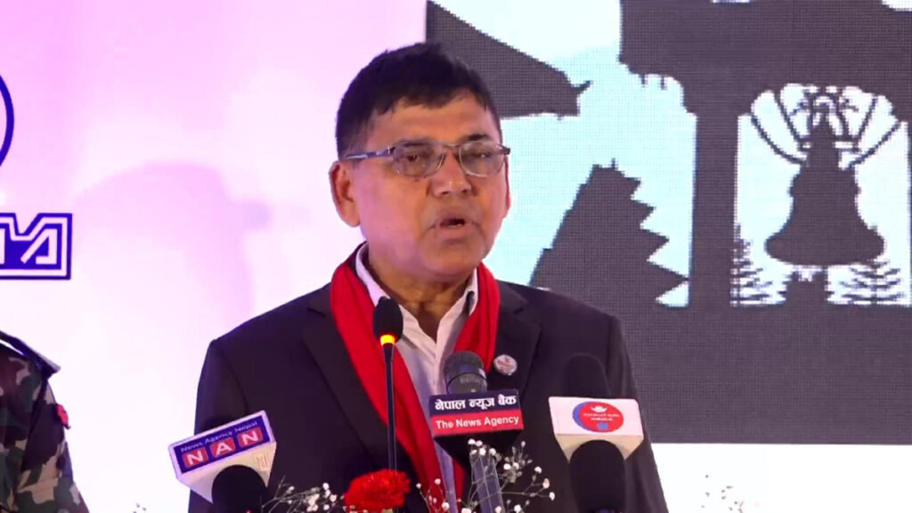 Transport Minister Devendra Dahal speaking at the launch event of Nepal’s electric bus service in Kathmandu.