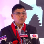 Transport Minister Devendra Dahal speaking at the launch event of Nepal’s electric bus service in Kathmandu.