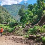 Landslide blocking East-West Highway in Nawalparasi district, Nepal, with stranded vehicles and damaged road caused by heavy rainfall and flooding.