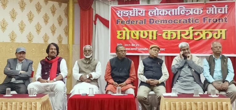 Leaders and organizers of the Federal Democratic Alliance gathered indoors preparing materials and discussing plans for the public awareness campaign in Kailali.