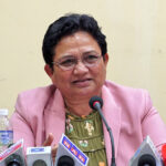 Pampha Bhusal speaking at a program in Kathmandu about songs and democracy