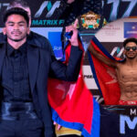 Rabindra Dhant holding Nepal flag after winning MFN 17 Bantamweight Championship title