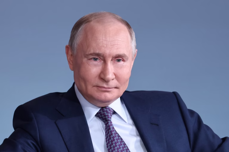 Russian President Vladimir Putin speaking at an official event in Moscow, warning Western nations over troop deployment in Ukraine.