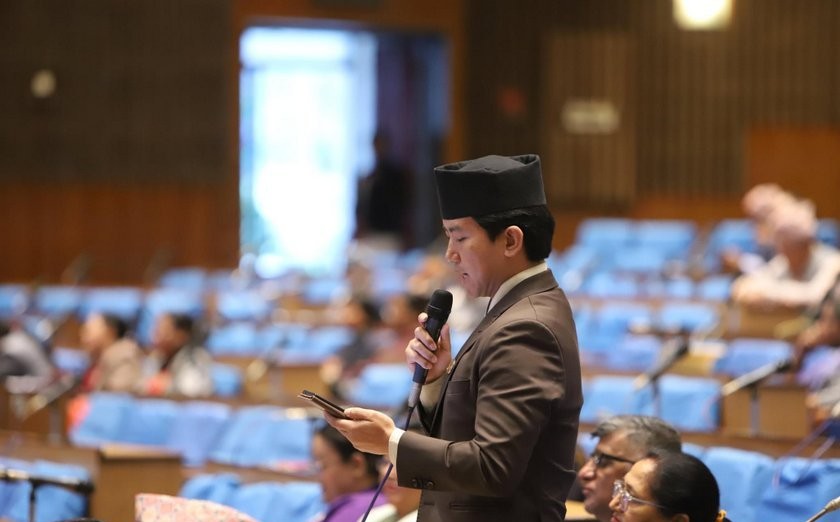 CPN-UML lawmaker Suhang Nembang speaking at the House of Representatives in Kathmandu, urging suspension of embossed number plate implementation in Nepal.