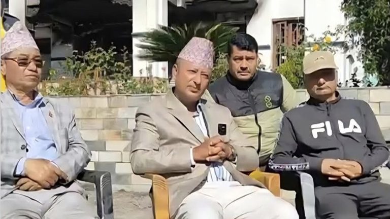 Former Energy Minister Deepak Khadka speaks to reporters at his Budhanilkantha residence following the money-scattering incident.