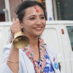 Dr. Tosima Karki speaking during a public event in Kathmandu, addressing party reform and inclusivity within the Rastriya Swatantra Party.