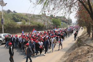 UML supporters gather near Karki Banquet in Kathmandu ahead of the National Volunteer Force announcement.